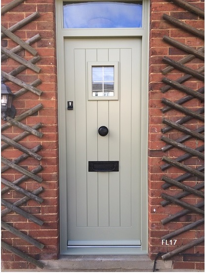 painted cottage door with toplight
