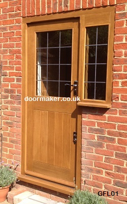oak half lead glazed framed ledged door with side window